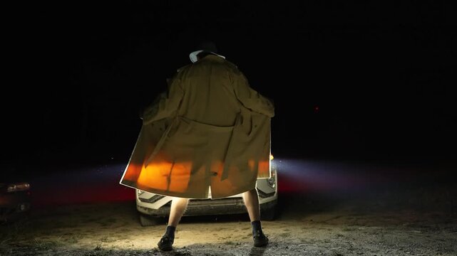 Male exhibitionist in trench coat opening coat to expose himself in public