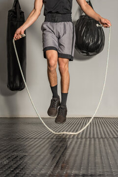 close up of boxer legs jumping rope during training session
