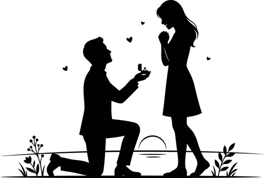 Man proposing to a woman at sunset
