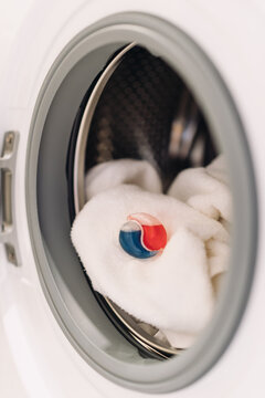 Modern household washing machine with laundry detergent pod