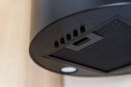 Modern kitchen exhaust hood appliance, close up shot