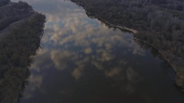 Aerial view of river with forest banks under Warsaw Poland
