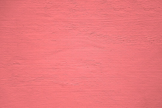 pink violet red stucco wall texture, peach fuzz color background. Abstract artistic backdrop for design. color, pastel orange plaster, exterior wall building texture pattern