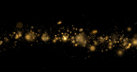 Golden glitter particles drift gently through transparent space. Soft light creates a warm festive glow. Elegant luxury effect for modern designs. © dedstock