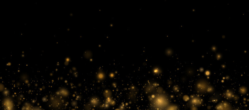 Golden dust particles swirl gracefully over transparent dark canvas. Sparkling light trails create dynamic luxury festive motion effect.