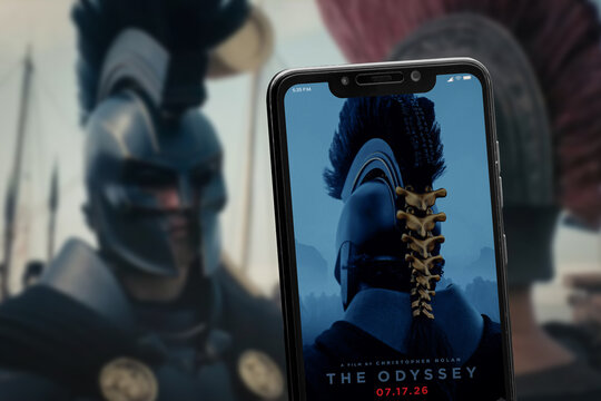  Cali, Colombia - May 28 2026: Smartphone displaying The Odyssey movie poster with cinematic background
