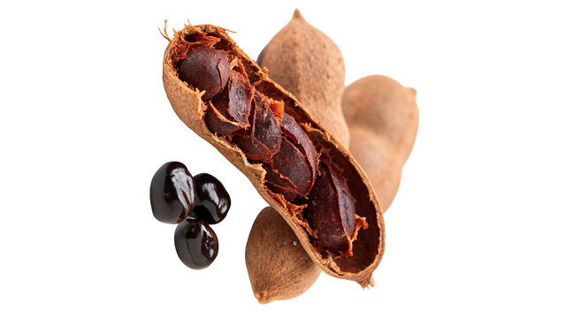 Open exotic tamarind pod with seeds close up isolated on transparent background