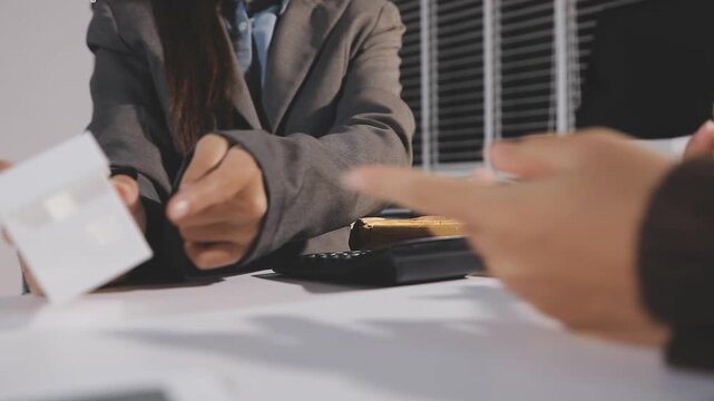 The real estate agent closes the deal with the client and they sign the contract.