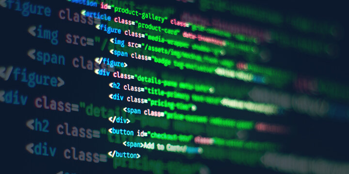 Blurred HTML and CSS web development syntax code displayed on a computer screen