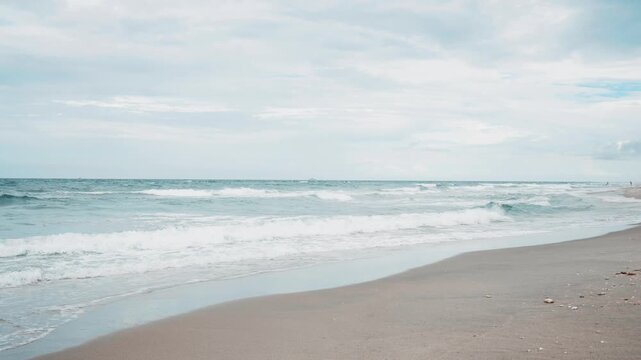 waves crashing on beach