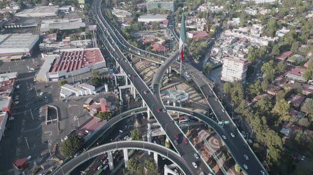 Aerial panoramic view of San Jeronimo highway interchange and monumental Mexican flag in Mexico City