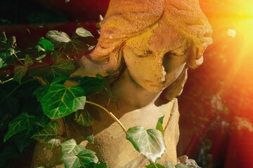 Obraz premium Angel of hope illuminated by warm heavenly sunlight.