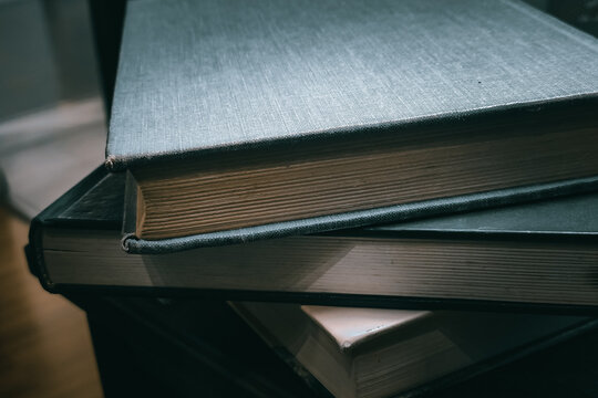 Vintage Hardcover Books Stack for Academic Research and Library Background, Dark Academia Aesthetic with Copy Space for Literature
