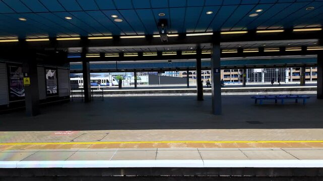 The view out of a train window arriving at Reading Station, UK