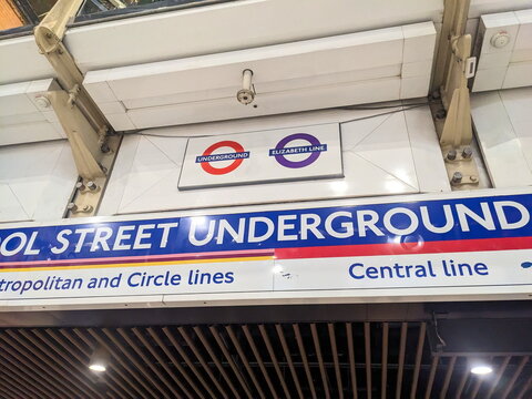 Close up of London Underground and Elizabeth Line wayfinding signs at Liverpool Street Station