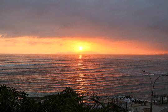Golden Sunset Over Lima Coastline