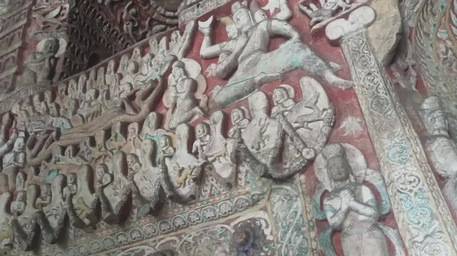 Ancient Buddhist Stone Carvings in Yungang Grottoes, Datong, China.	
