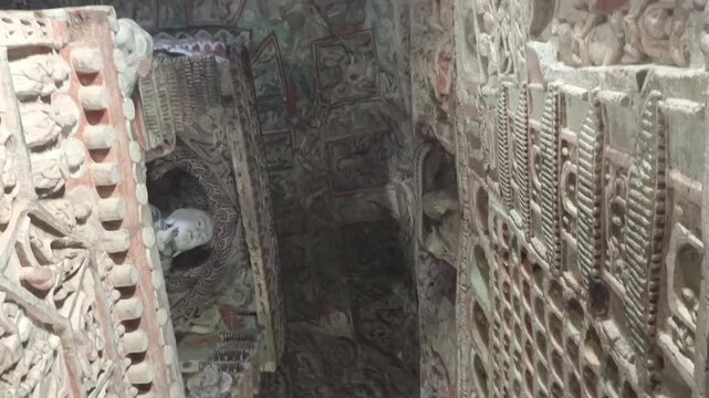 Ancient Buddhist Stone Carvings in Yungang Grottoes, Datong, China.	