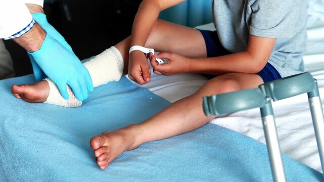 nurse putting bandage on patient