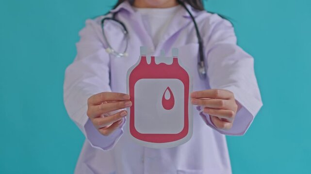 Close-up Slow Motion Blood Donation Process in Bright Medical Clinic with Calm Atmosphere