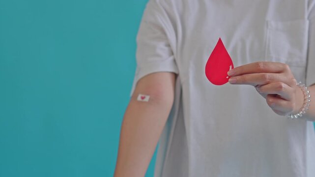 Close-up Slow Motion Blood Donation Process in Bright Medical Clinic with Calm Atmosphere