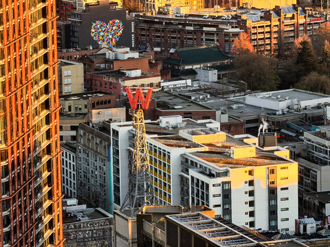 Vancouver , Canada - January 2026: Aerial view of Vancouver downtown with W Hotel sign and Keefer House at sunset