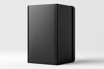 Naklejka premium Black textured rectangular box standing on a clean white studio background with sharp focus for product packaging and electronics marketing