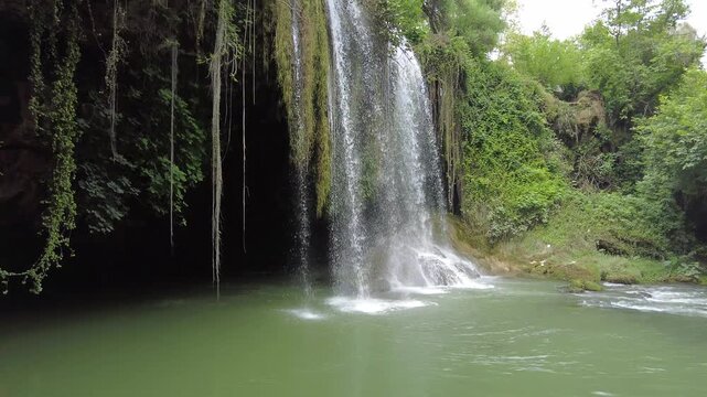 Lush Green Waterfall and Cave in Duden Waterfall Park, Antalya Turkey