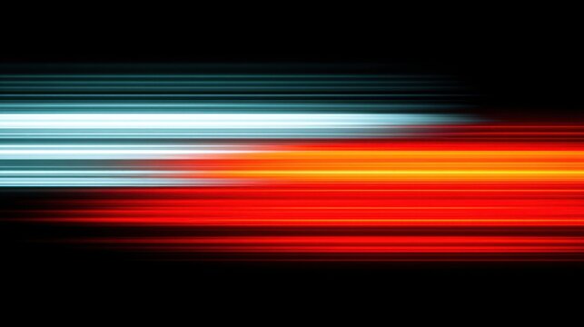 Vibrant abstract light trails in blue and red on a dark background.