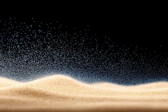 An abstract close-up of fine sand with particles suspended in the air.