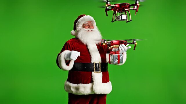 Santa Claus with Drone and Gift on Green Screen Background.