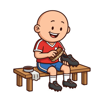 Little boy cleaning his black shoes.