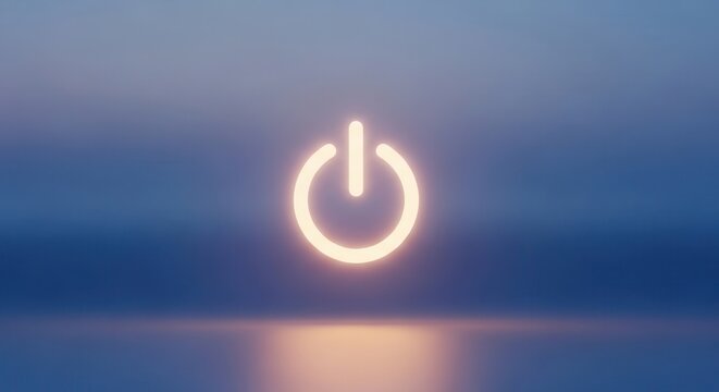 Glowing power button symbol floating over a calm ocean at sunset.