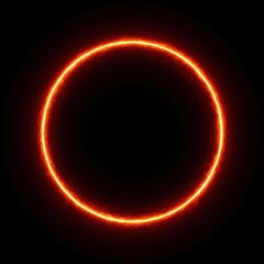 Naklejka premium A glowing fiery circle against a dark background, creating a striking visual contrast.