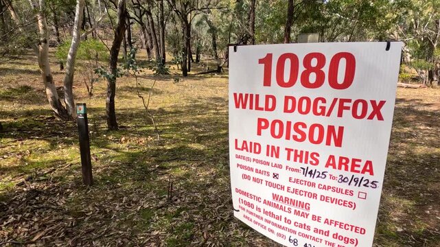 Wild Dog and Fox Poison Warning Sign in Australian Bushland