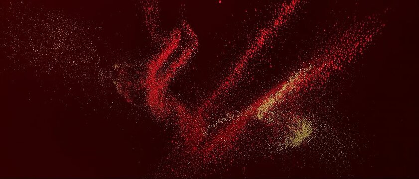 Golden Powder and Red Pigment Exploding Underwater