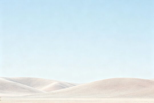 Sandy dunes under clear sky