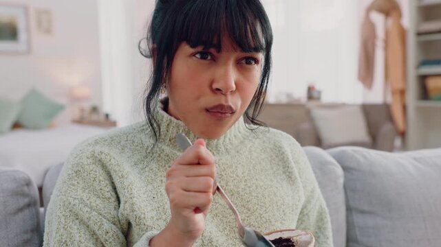 Eating ice cream, watching tv and woman with laugh for comic film on sofa, happy with subscription service movie and food in lounge of house. Girl eating sweet dessert with television comedy show
