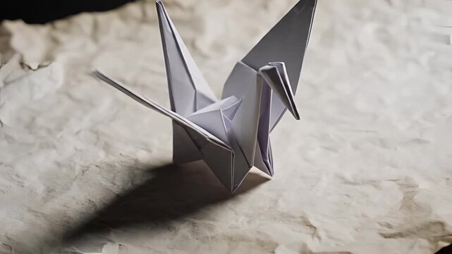 Origami Crane Folding Process Step by Step on Textured Background.