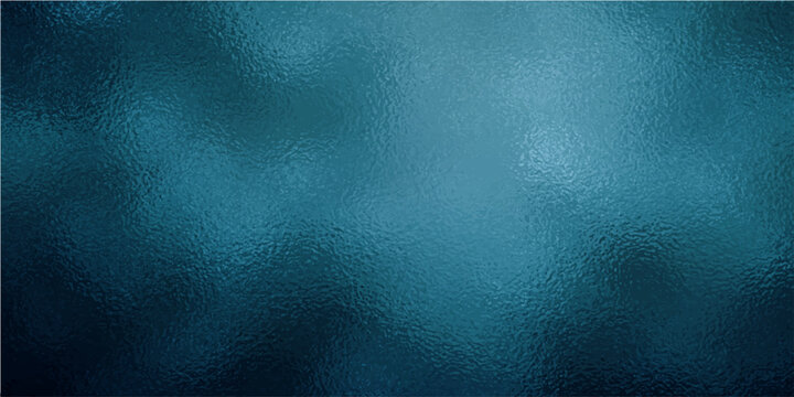 Abstract blue textured background with light and shadow play and a soft focus effect suggesting depth and atmosphere.