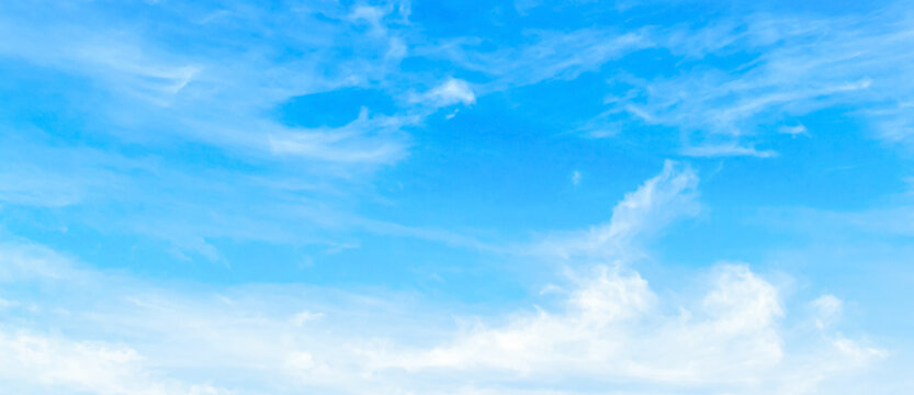 Beautiful vibrant blue sky background with colorful soft white clouds for inspirational nature wallpaper panorama mockup