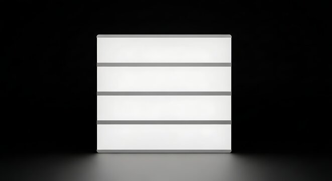 Square illuminated lightbox display with four horizontal segments glowing against deep black background for retail signage