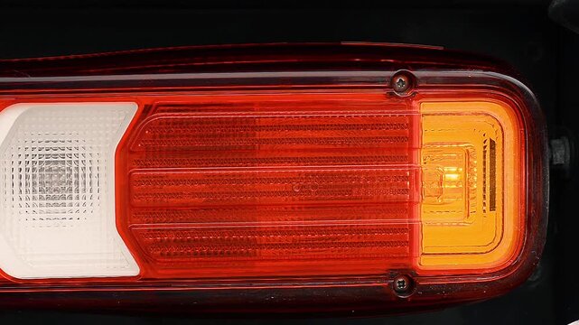 Car rear taillight blinking turn signal indicator