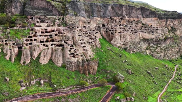 Aerial drone view of Vardzia cave monastery site in southern Georgia, excavated from the slopes of the Erusheti Mountain on the left bank of the Kura River,
