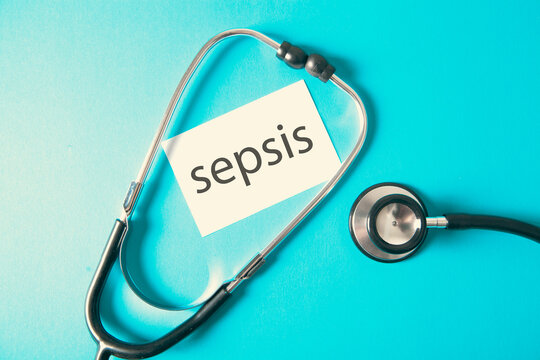 Stethoscope and word SEPIS on a blue background.