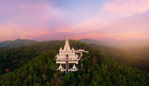 Aerial view White pagoda Loha Prasat Sri Mueang Pong temple on sunset in Chiang Mai, Thailand