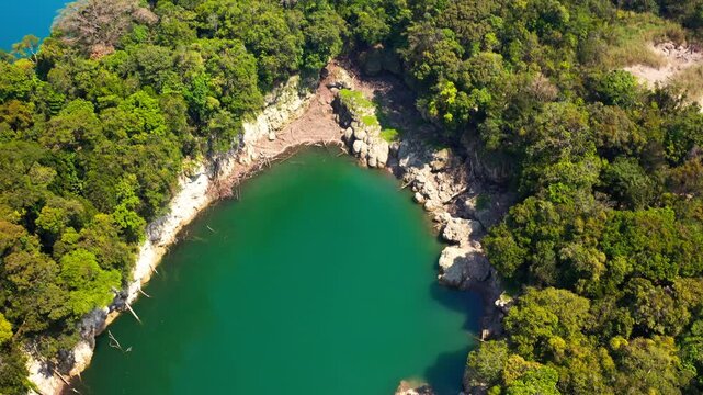 Aerial Drone View of Colorful Cenotes in Laguna Brava, Guatemala
