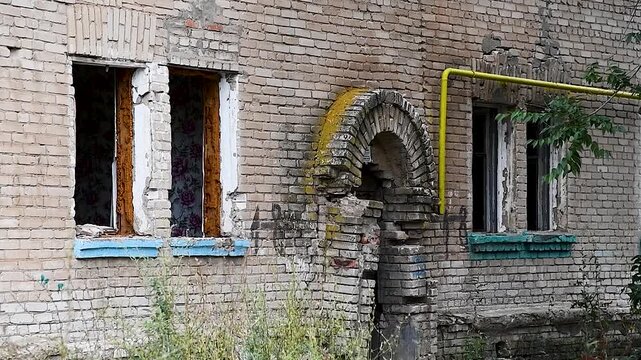 Facade of the old dilapidated house