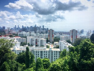 Obraz premium Singapore cityscape with residential buildings, port and lush greenery, February 2019
