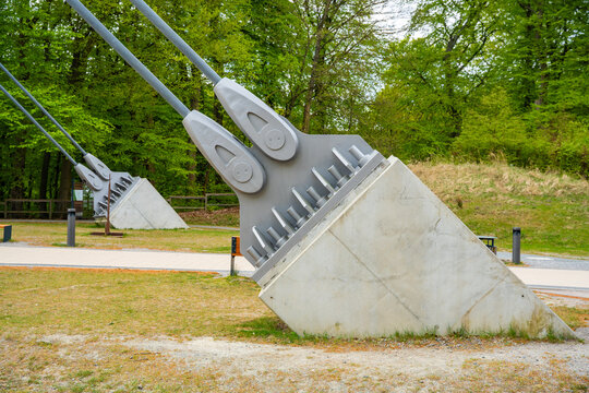 Steel cable anchors of suspension bridge in Jasmund National Park on Ruegen island, Germany. Engineering detail of tourist viewpoint near white chalk cliffs